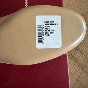 Ferragamo light pink flats. Brand new in original box. Size 7.5 B